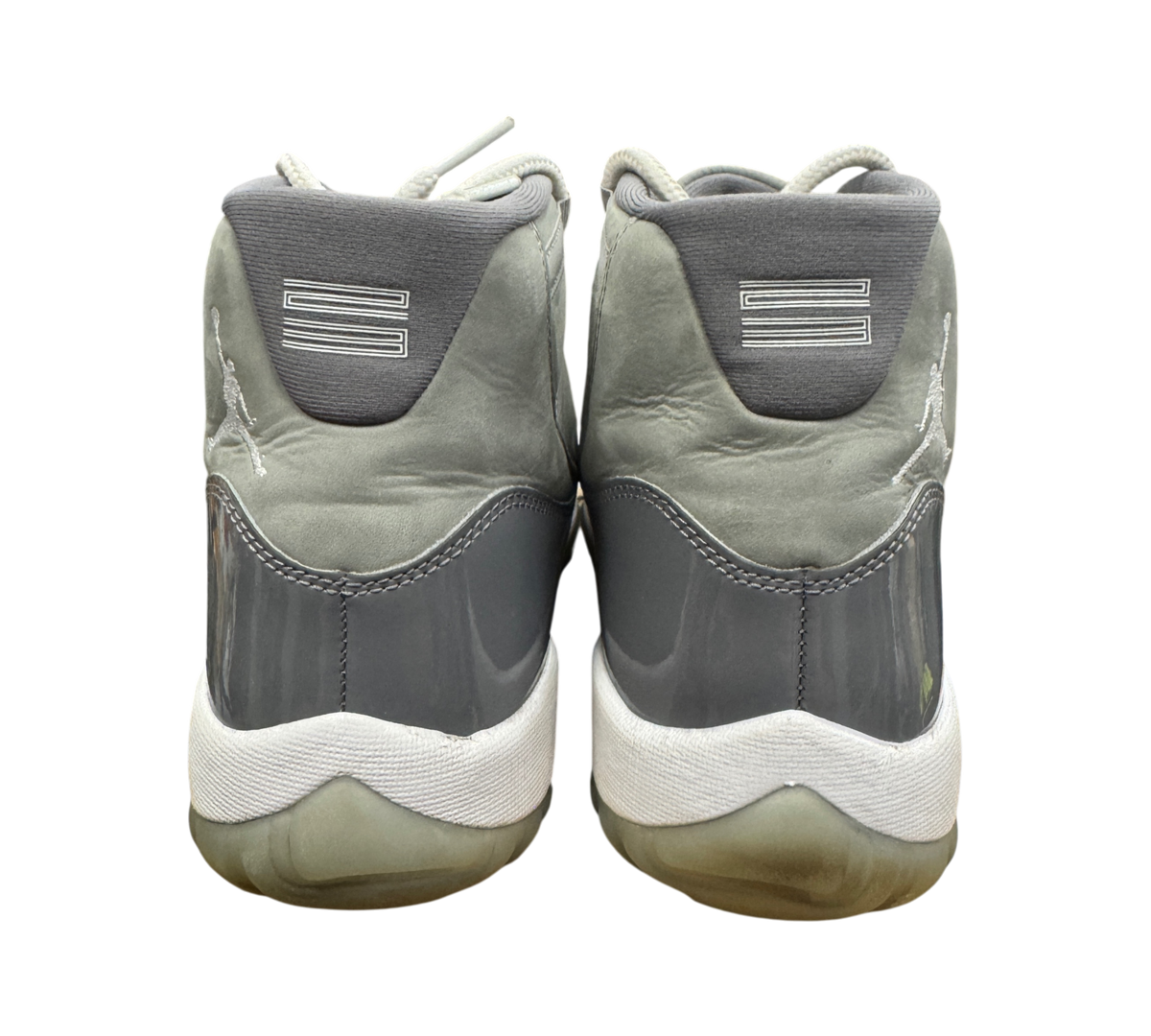 Genesis Boutique pre-owned Jordan 11 Cool Grey sneakers showing the grey patent leather heel and white midsole