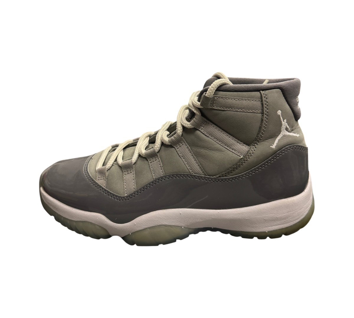 Genesis Boutique Jordan 11 Cool Grey sneakers featuring a grey patent leather mudguard and white midsole