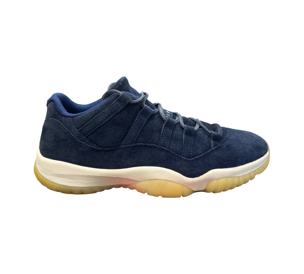 Genesis Boutique Jordan 11 Derek Jeter RE2PECT sneakers in navy blue suede with a cream midsole and gum outsole.