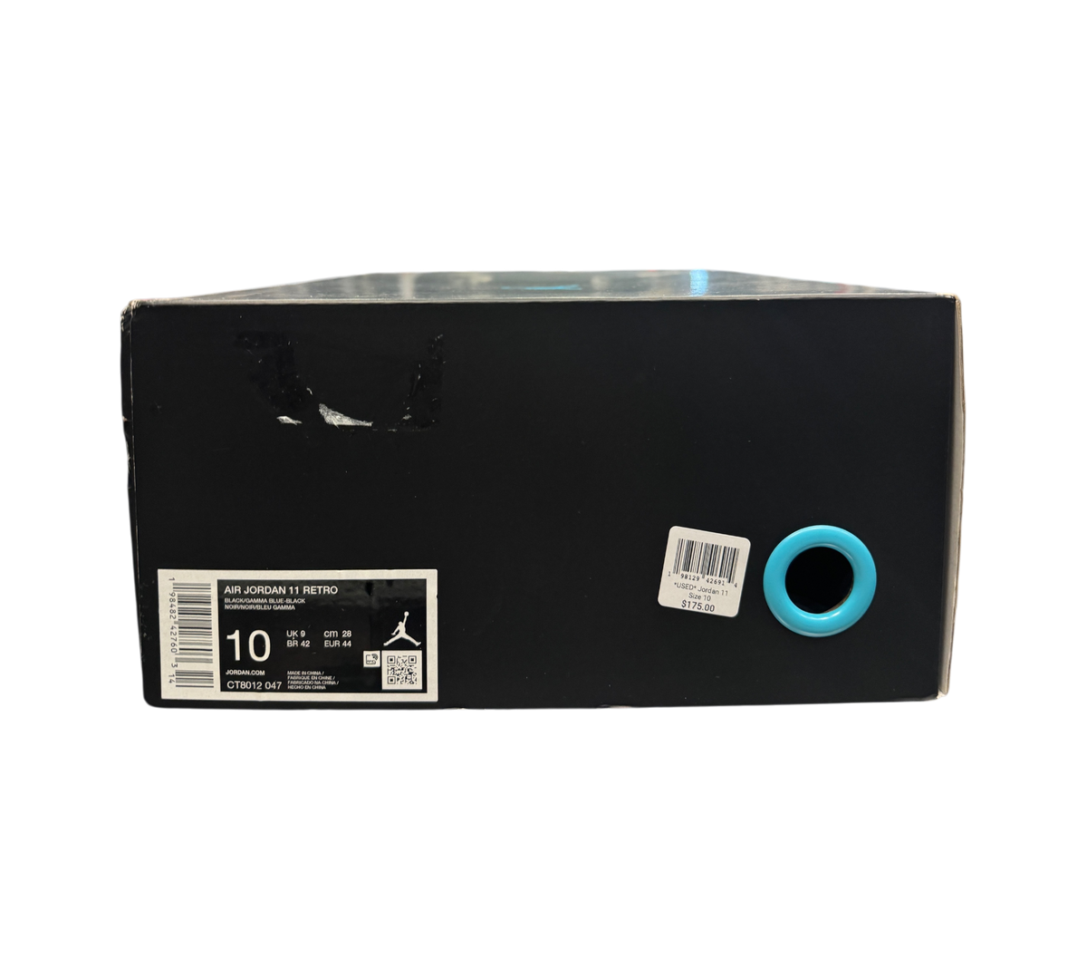 Genesis Boutique Jordan 11 Gamma sneaker box with size 10 label and retail price tag in a retail store setting