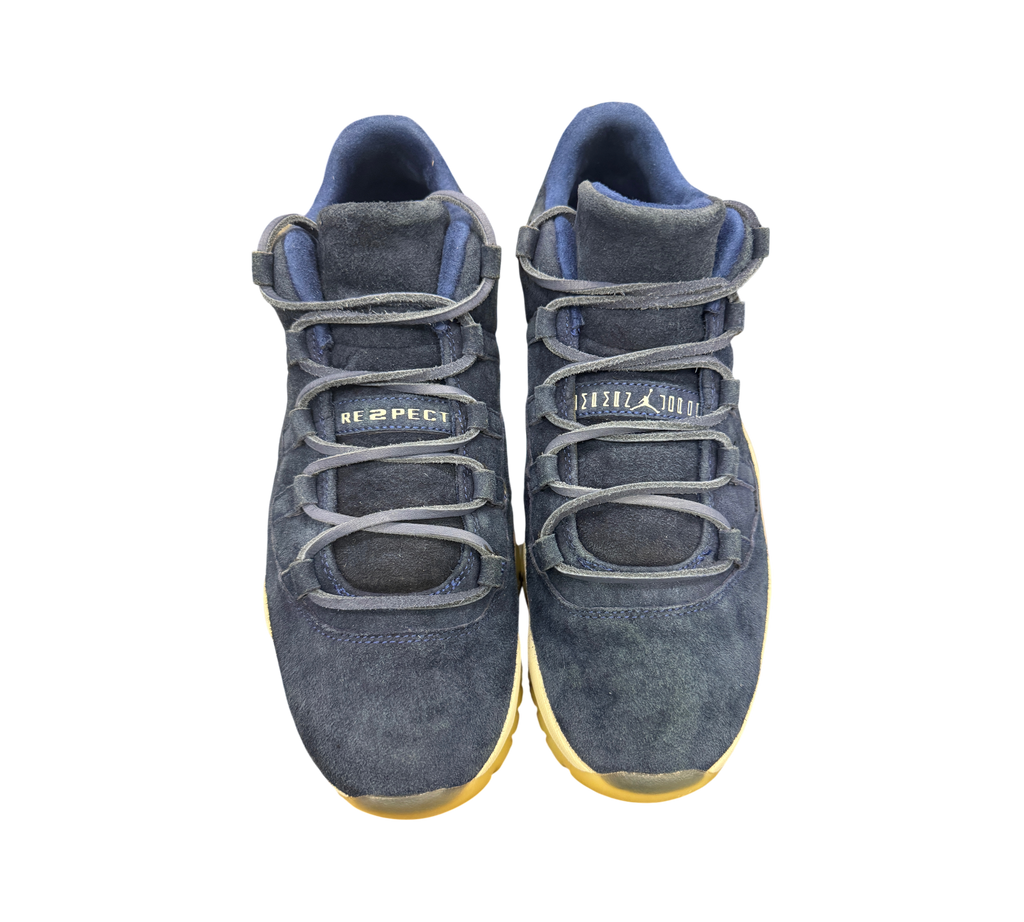 Genesis Boutique Jordan 11 Derek Jeter RE2PECT sneakers in navy blue suede with matching laces and tongue branding.