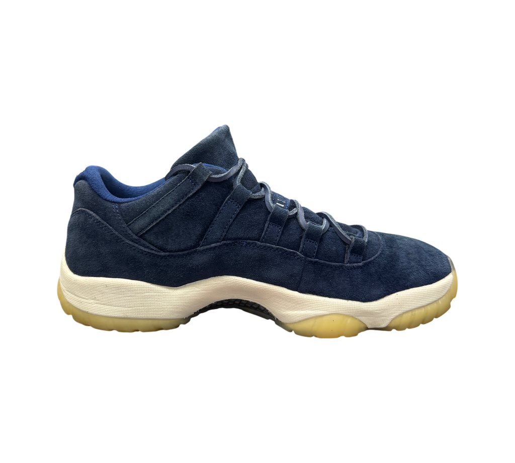 Genesis Boutique Jordan 11 Derek Jeter RE2PECT sneakers in navy blue suede with a white midsole and gum outsole.