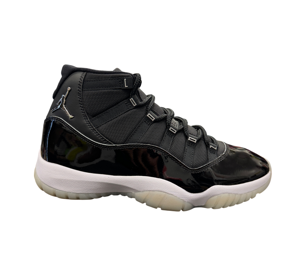 Genesis Boutique Jordan 11 Jubilee sneaker in black with patent leather mudguard and metallic silver Jumpman logo