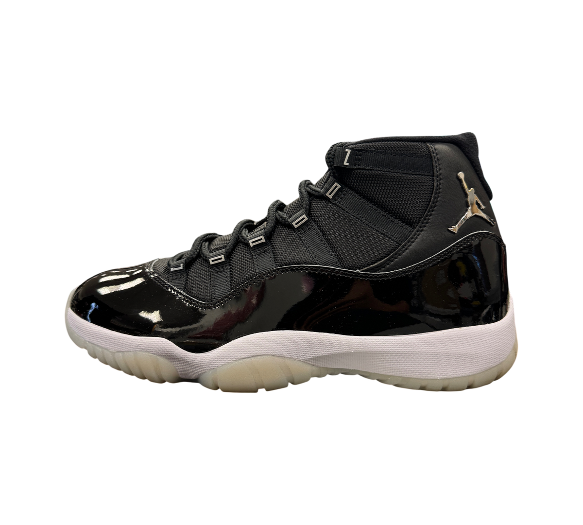 Genesis Boutique Jordan 11 Jubilee sneakers in black patent leather with metallic silver Jumpman logo