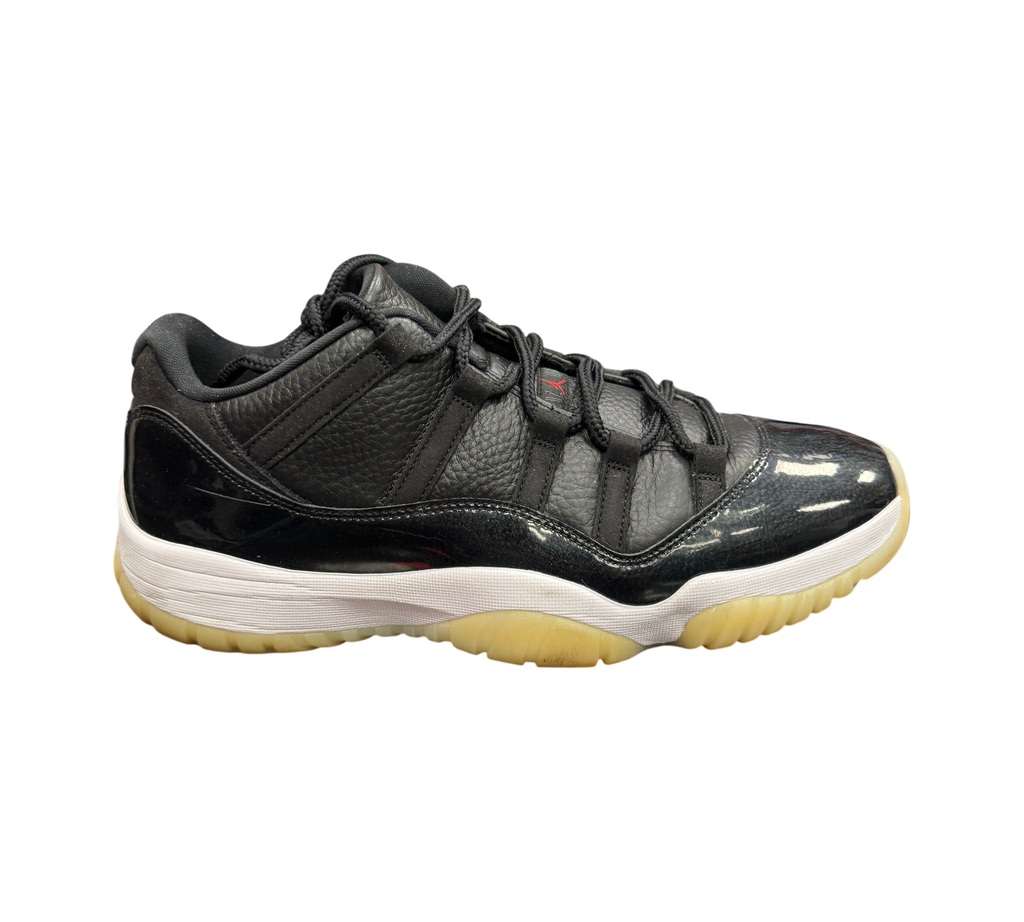 Genesis Boutique Jordan 11 Low 72-10 sneakers in black leather and patent leather with a white midsole and gum outsole