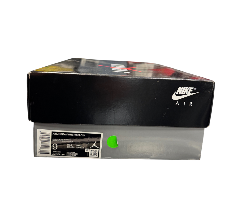 Genesis Boutique Jordan 11 Low 72-10 sneaker box with Nike Air branding and size label in a retail store setting