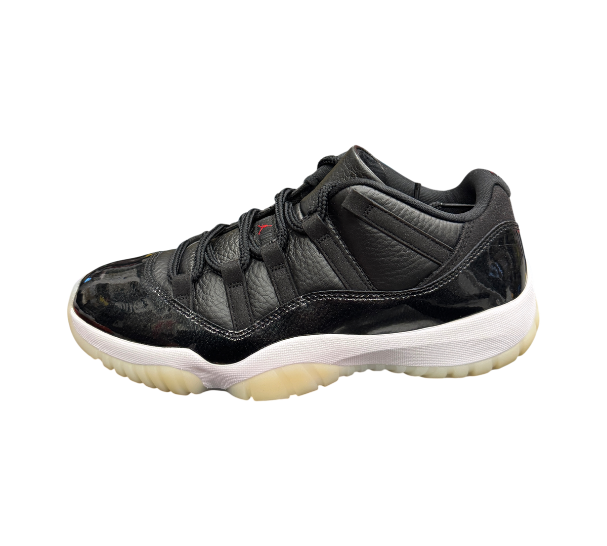 Genesis Boutique Jordan 11 Low 72-10 sneakers in black leather and patent leather with a white midsole