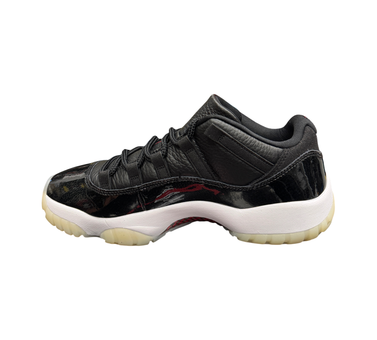 Genesis Boutique Jordan 11 Low 72-10 sneakers in black leather and patent leather with a white midsole