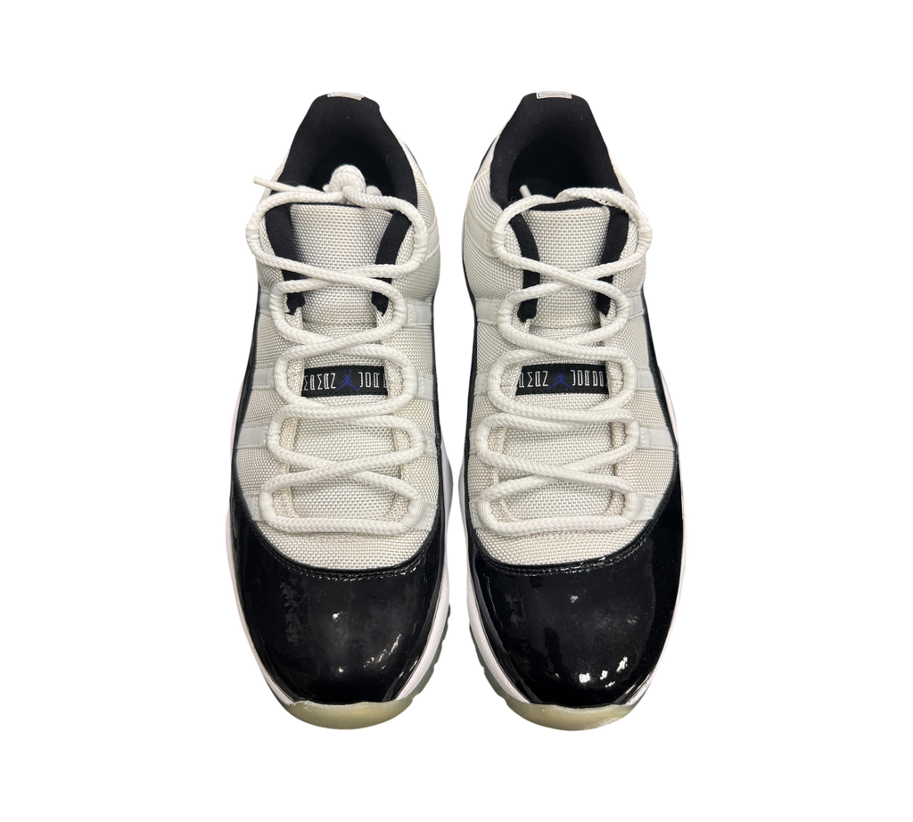 Genesis Boutique pre-owned Jordan 11 Low Concord sneakers featuring white mesh uppers and black patent leather mudguards