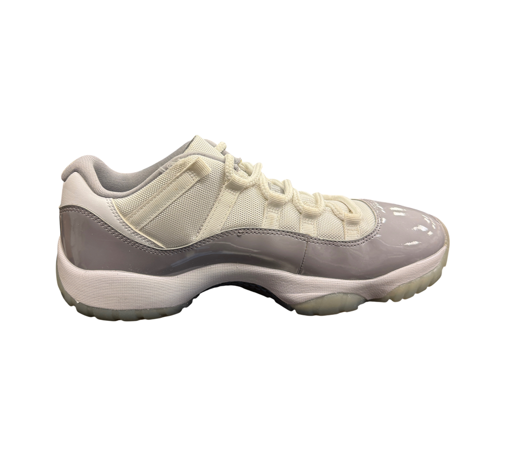 Genesis Boutique pre-owned Jordan 11 Low Grey Cement sneakers with white mesh upper and grey patent leather mudguard.