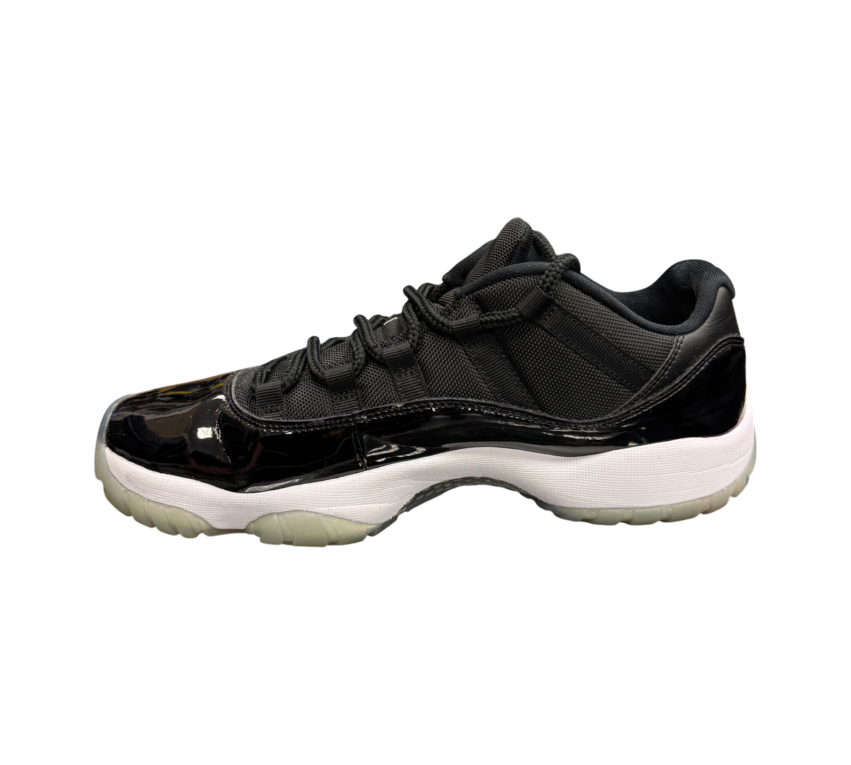 Genesis Boutique pre-owned Jordan 11 Low Space Jam sneakers featuring black patent leather and mesh upper
