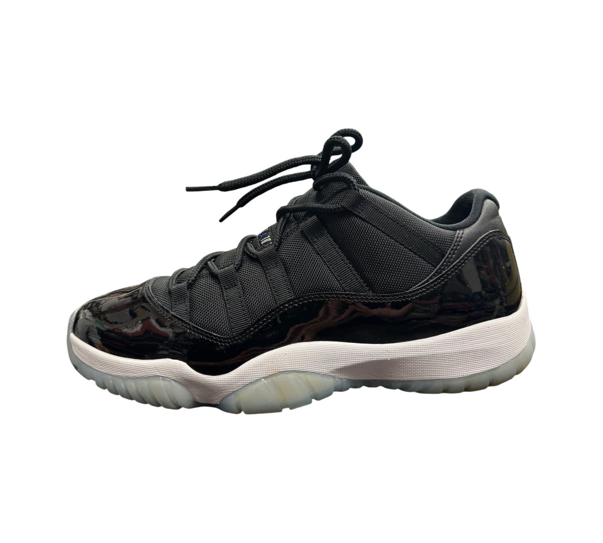 Genesis Boutique Jordan 11 Low Space Jam sneakers in black with patent leather mudguard and translucent outsole