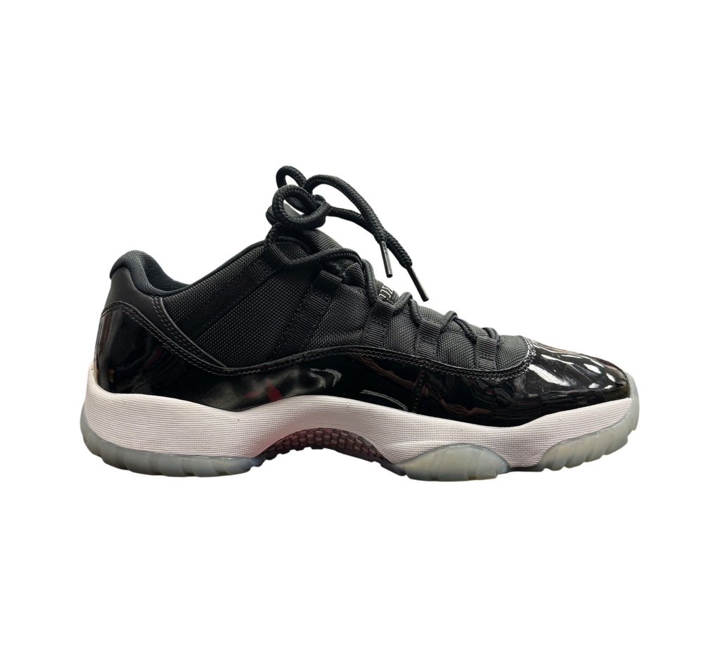 Genesis Boutique Jordan 11 Low Space Jam sneakers in black patent leather with a white midsole and icy translucent sole