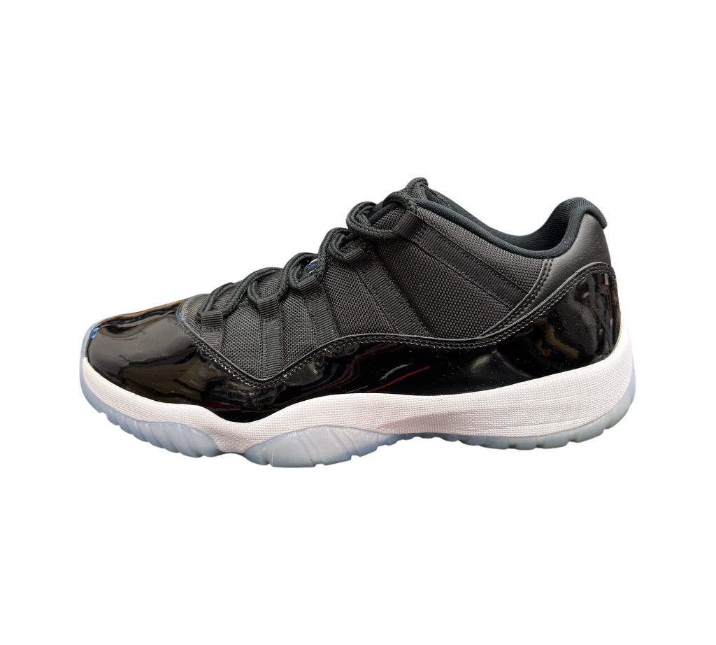 Genesis Boutique Jordan 11 Low Space Jam sneaker in black patent leather and mesh with a white midsole and icy outsole.