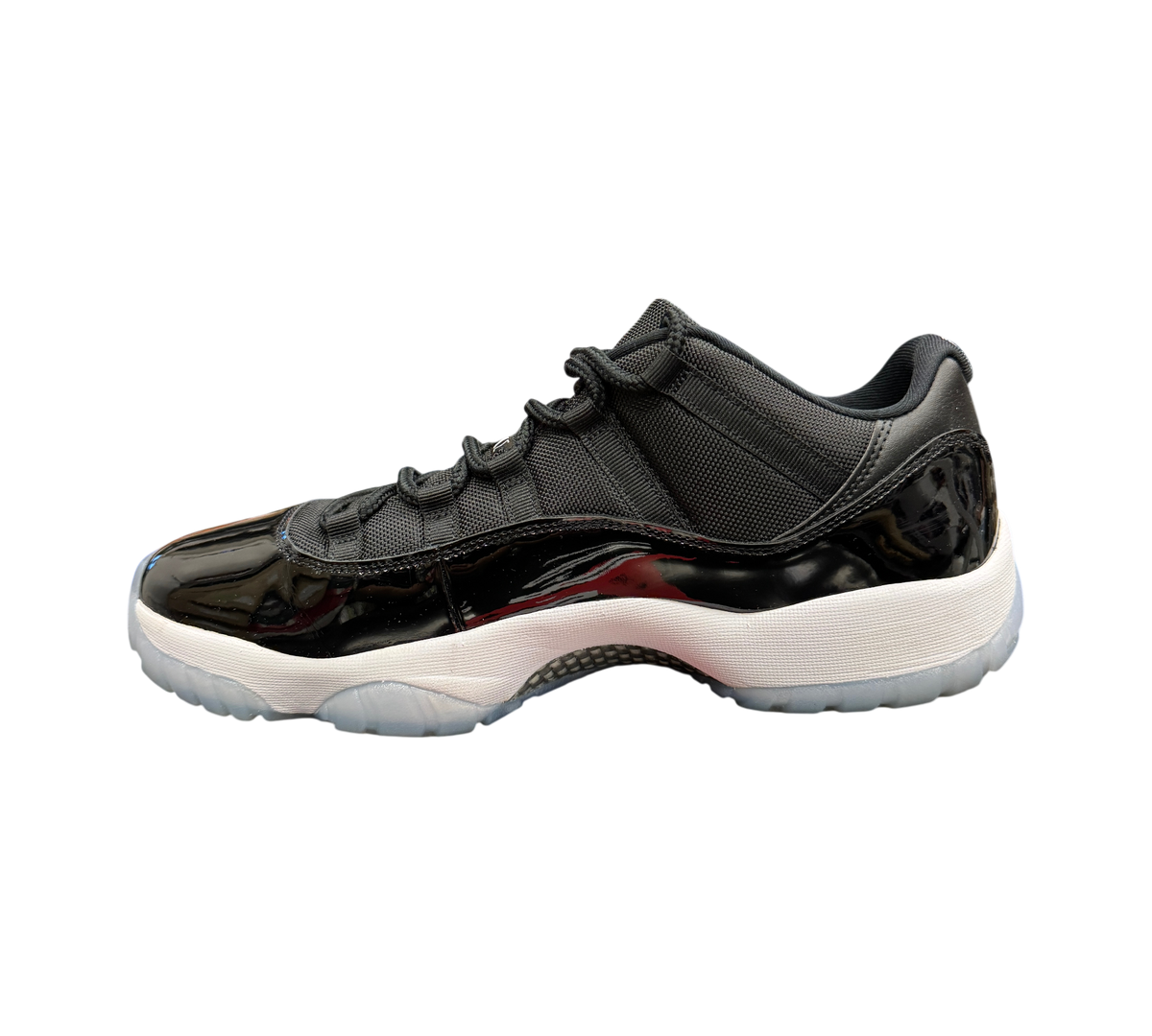 Genesis Boutique Jordan 11 Low Space Jam sneakers in black patent leather with white midsole and icy blue outsole