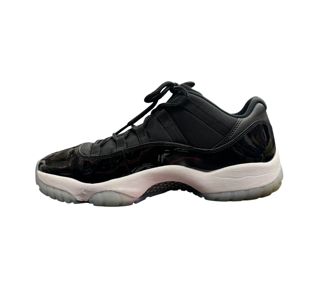 Genesis Boutique Jordan 11 Low Space Jam sneakers in black patent leather with white midsole on original shoe box