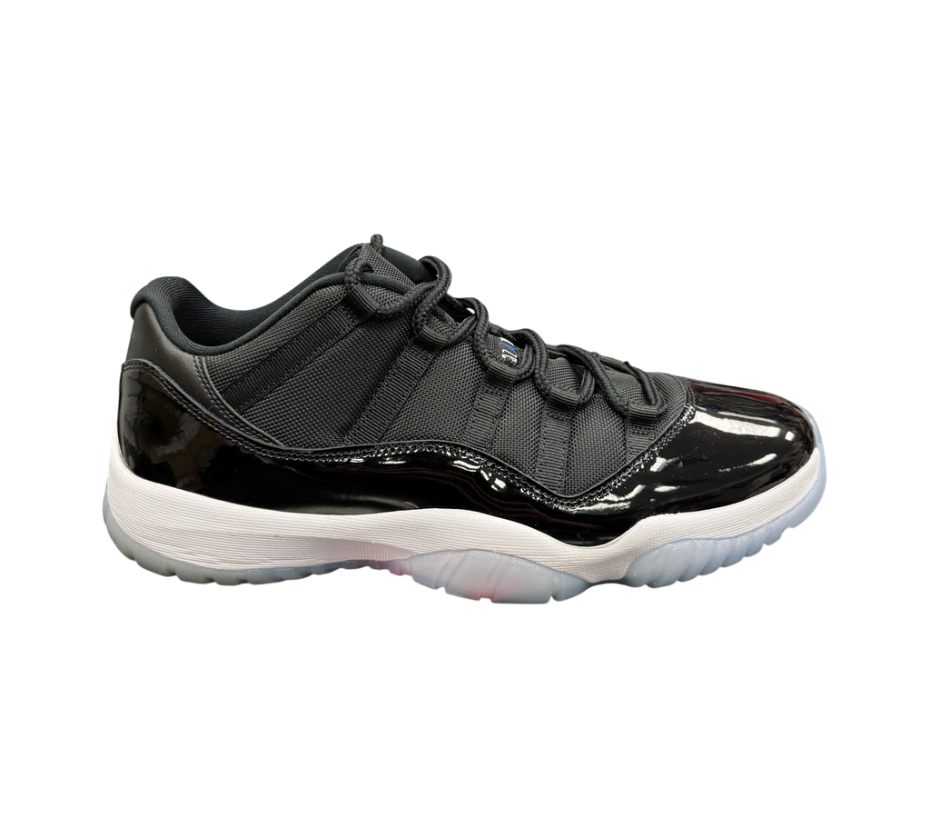 Genesis Boutique Jordan 11 Low Space Jam sneakers in black with patent leather mudguard and translucent icy outsole.