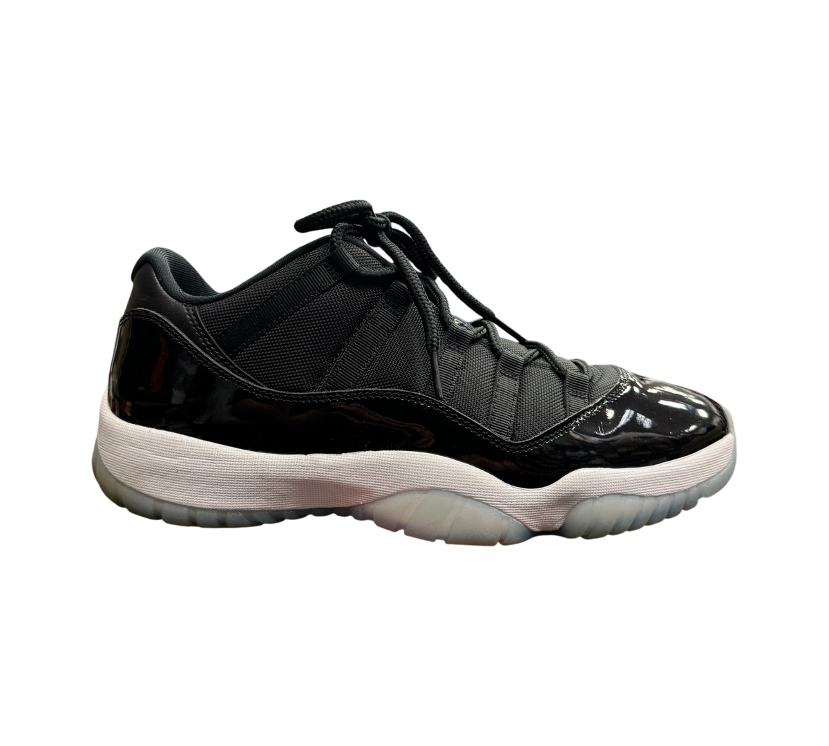 Genesis Boutique Jordan 11 Low Space Jam sneakers in black with patent leather mudguard and translucent outsole