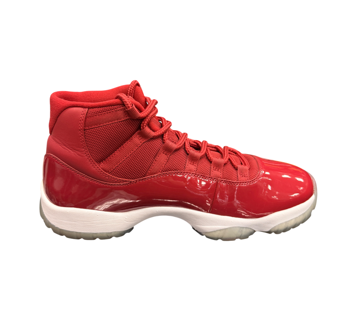 Genesis Boutique pre-owned Jordan 11 Win Like '96 sneakers in red with patent leather and yellowed soles.