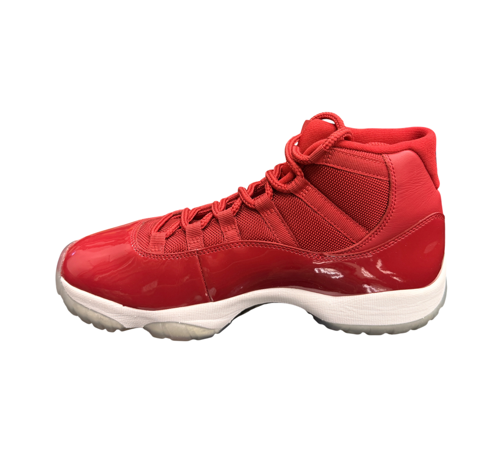 Genesis Boutique pre-owned Jordan 11 Win Like 96 sneakers in gym red with patent leather and yellowed translucent soles