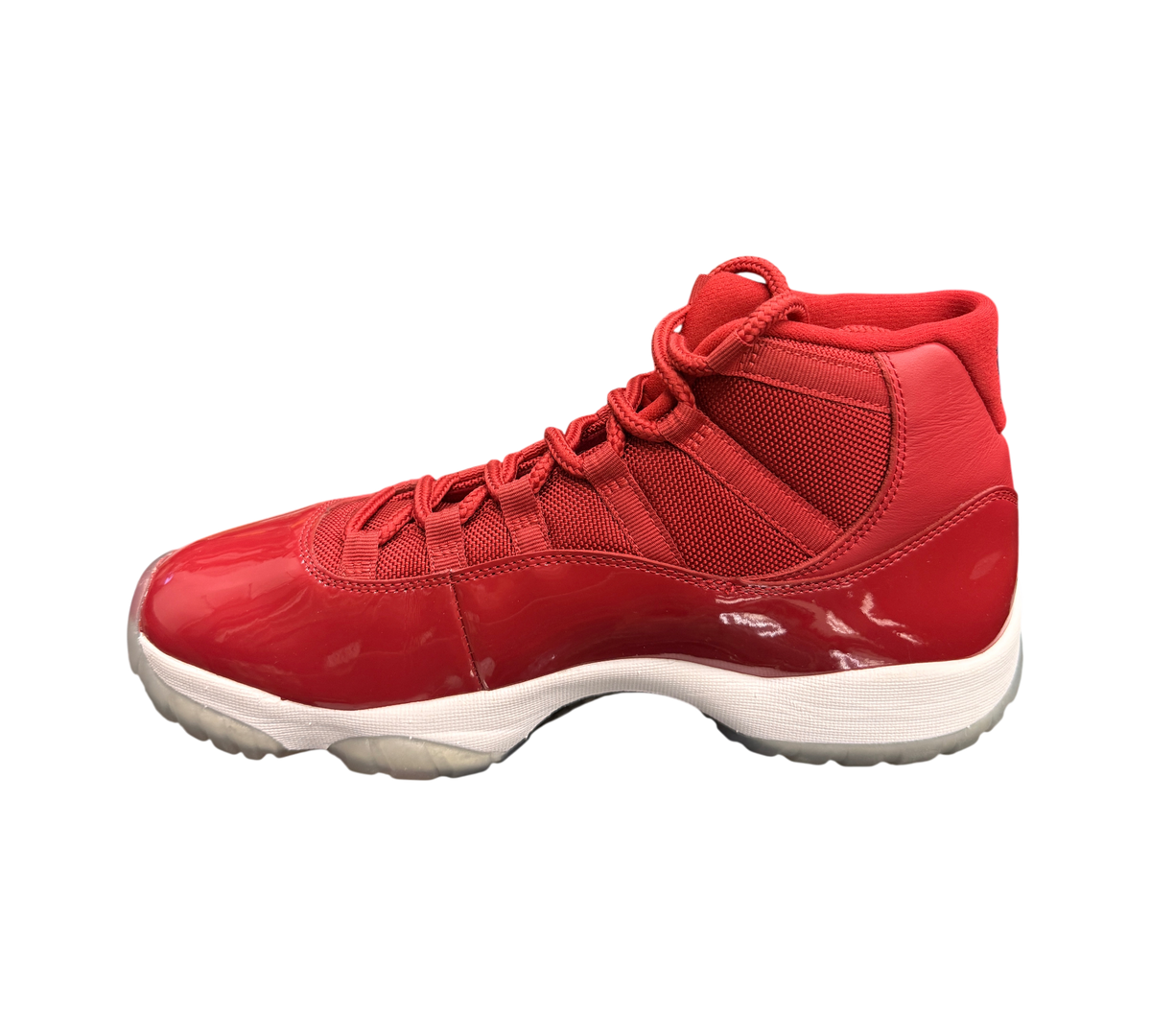 Genesis Boutique pre-owned Jordan 11 Win Like 96 sneakers in gym red with patent leather and yellowed translucent soles