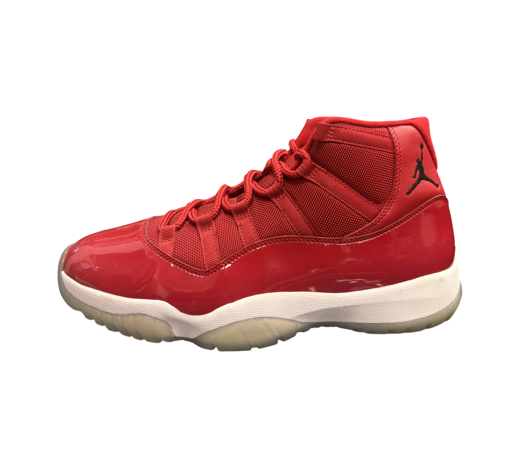 Genesis Boutique pre-owned Jordan 11 Win Like 96 sneakers in varsity red with patent leather and yellowed soles.