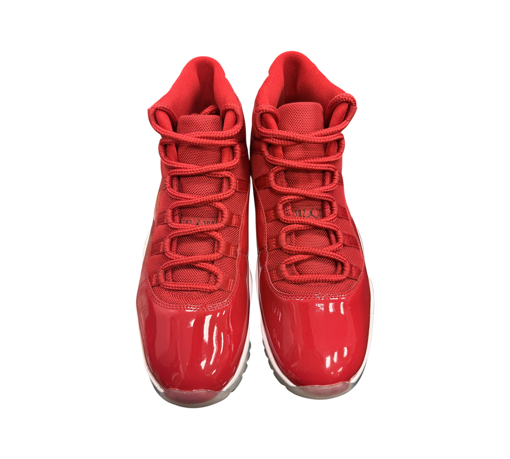 Genesis Boutique pre-owned Jordan 11 Win Like '96 sneakers in gym red with patent leather and yellowed soles.