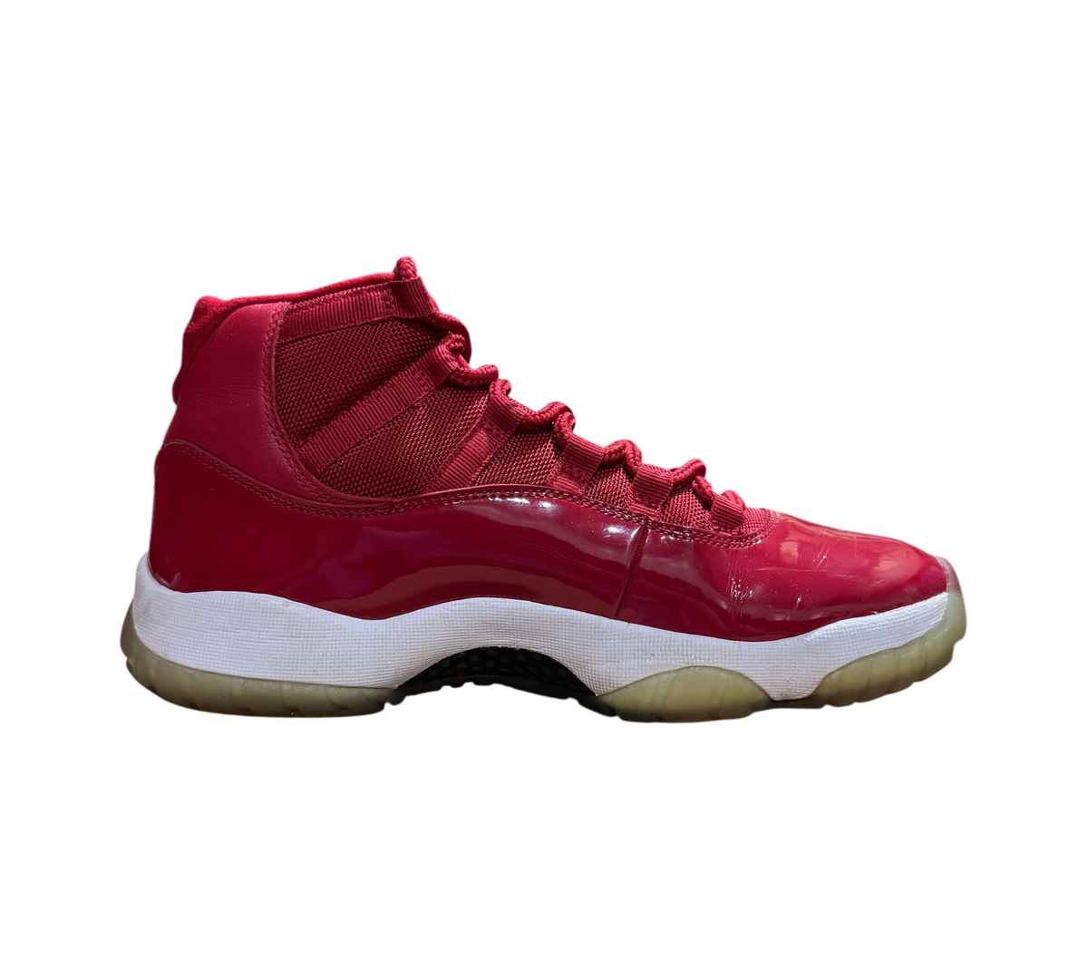 Genesis Boutique Jordan 11 Win Like 96 sneakers in red patent leather with white midsole and translucent outsole
