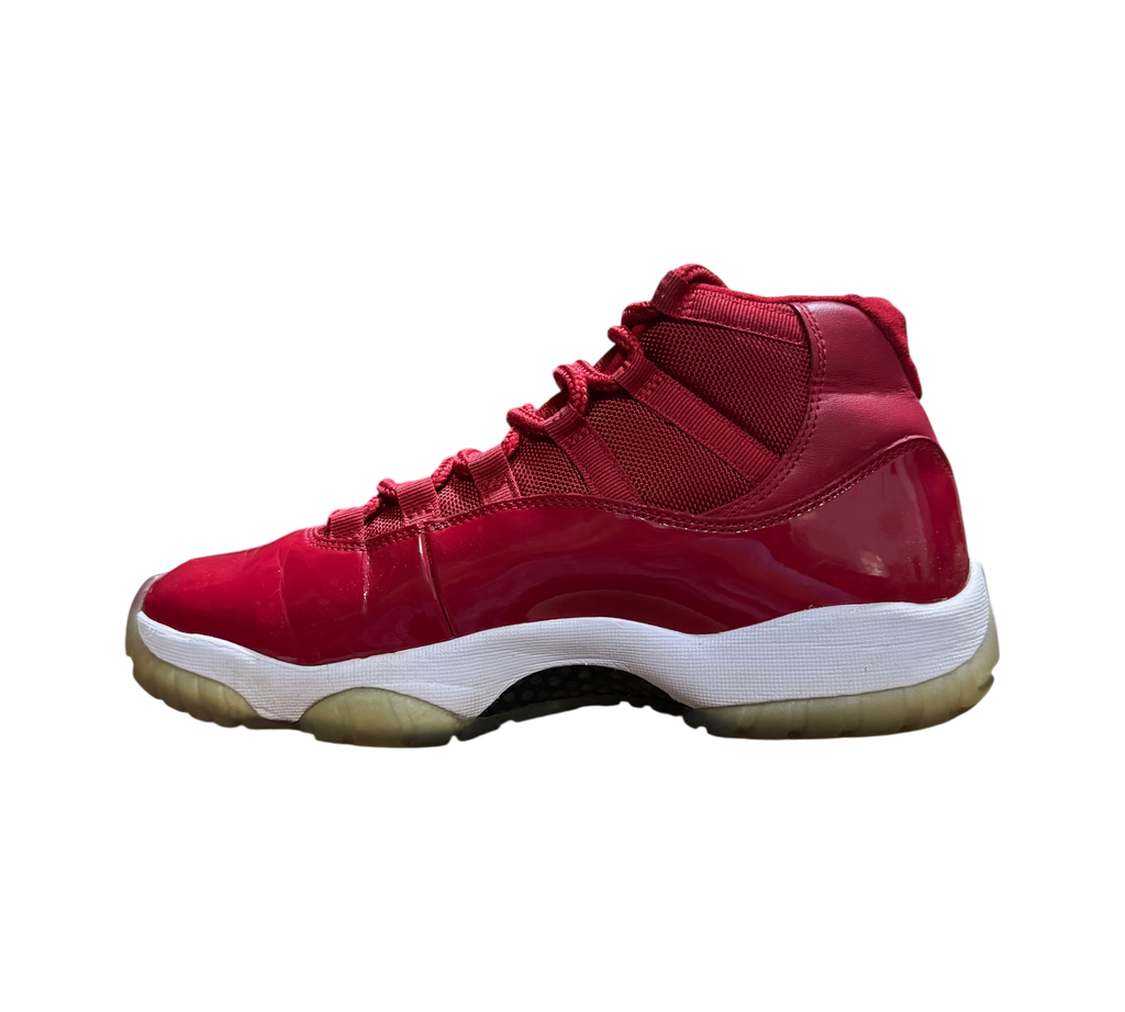 Genesis Boutique used Jordan 11 Win Like 96 sneakers in red patent leather with white midsole and translucent sole