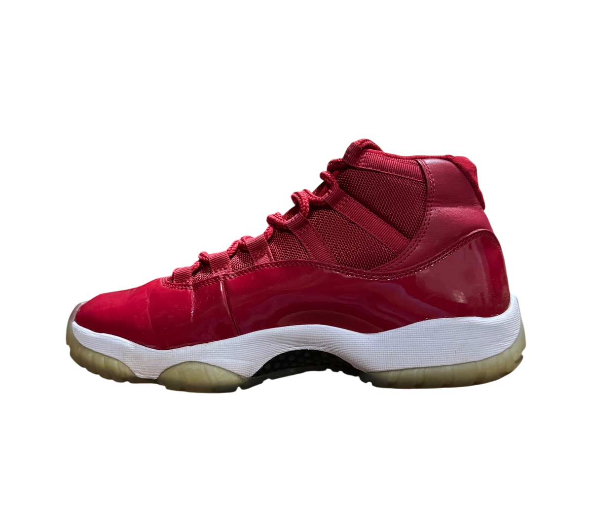Genesis Boutique used Jordan 11 Win Like 96 sneakers in red patent leather with white midsole and translucent sole