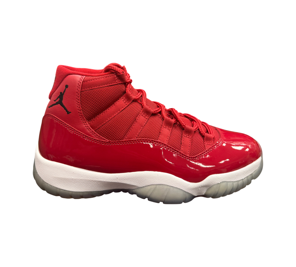 Genesis Boutique Jordan 11 Win Like 96 sneakers in red patent leather and mesh with a white midsole and icy outsole.