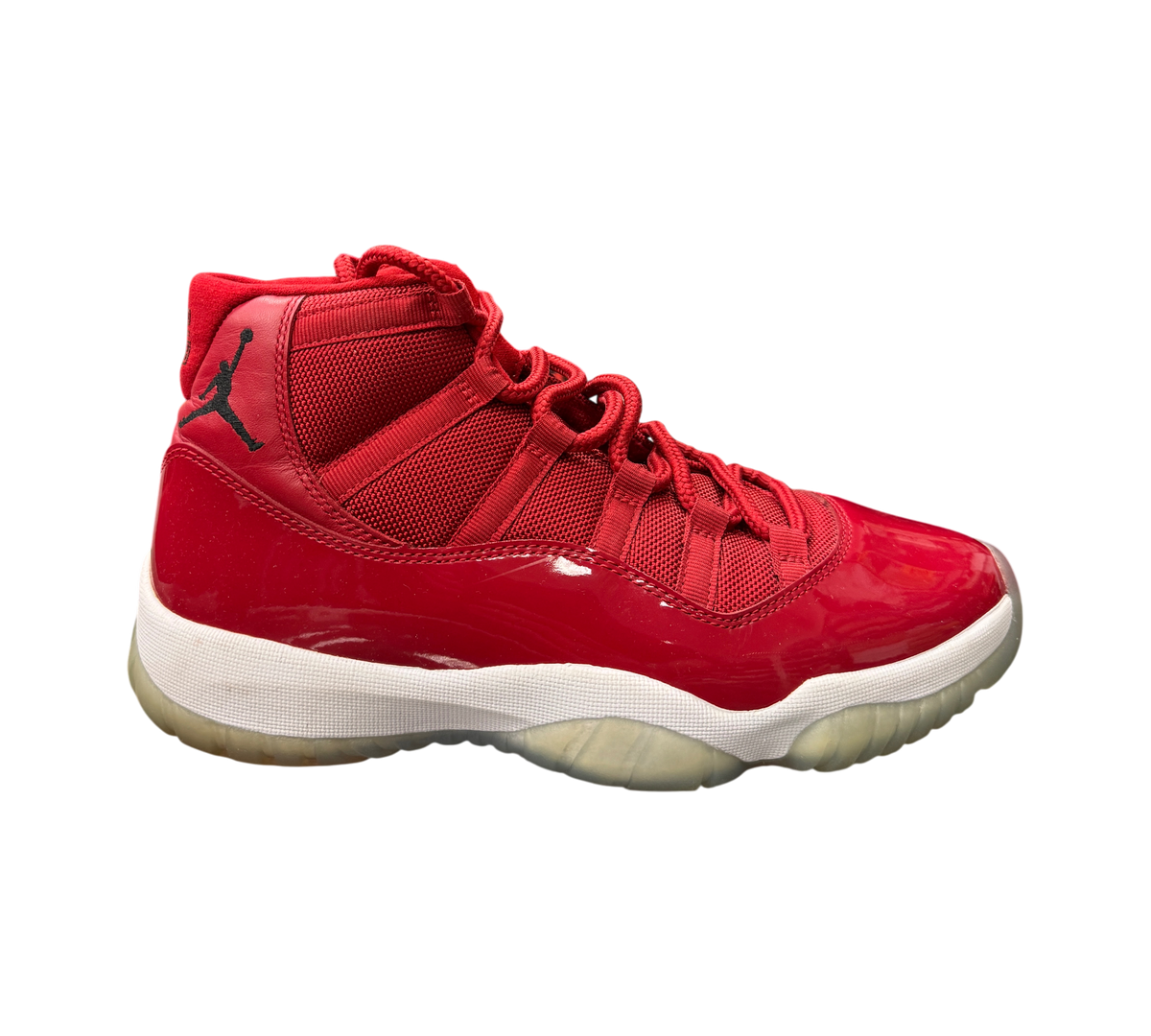 Genesis Boutique Jordan 11 Win Like 96 sneakers in gym red patent leather with white midsole and translucent outsole