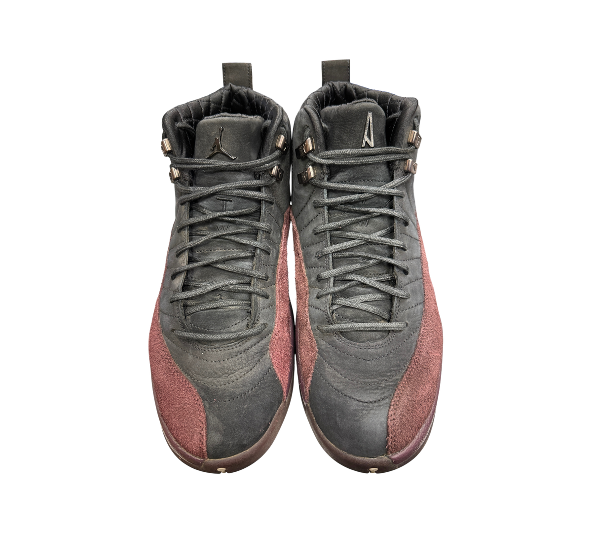 Genesis Boutique Jordan 12 A Ma Maniere Black sneakers featuring black leather and burgundy suede overlays.