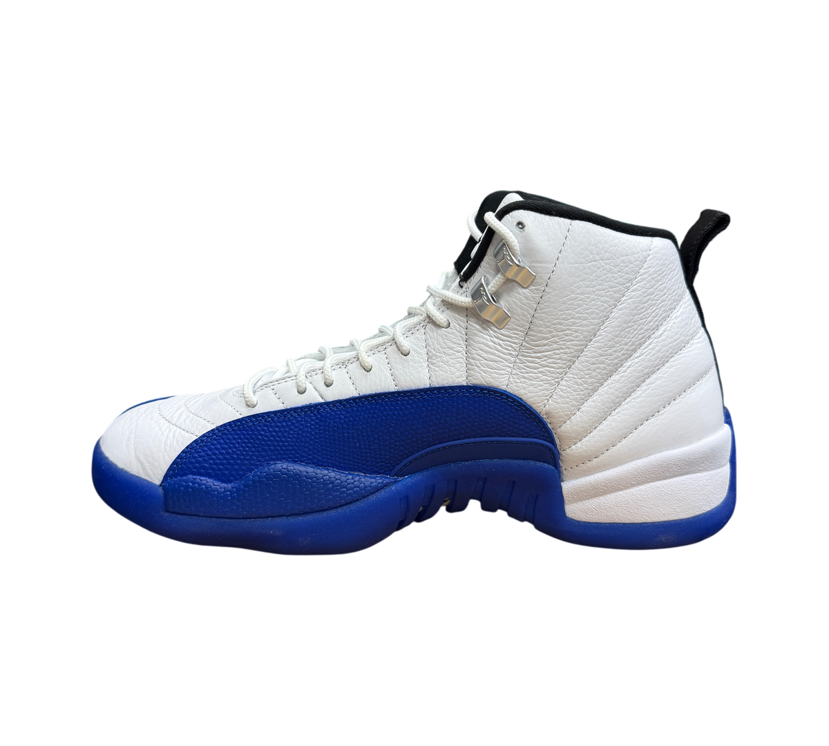 Genesis Boutique pre-owned Jordan 12 Blueberry sneakers featuring white leather and blue mudguard on a shoebox.