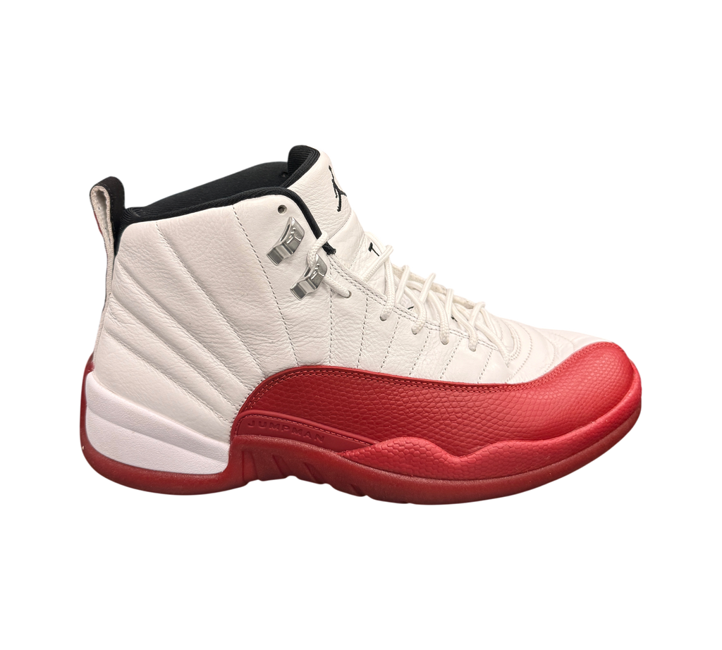 Genesis Boutique Jordan 12 Cherry sneakers in white and red leather with metallic silver eyelets.