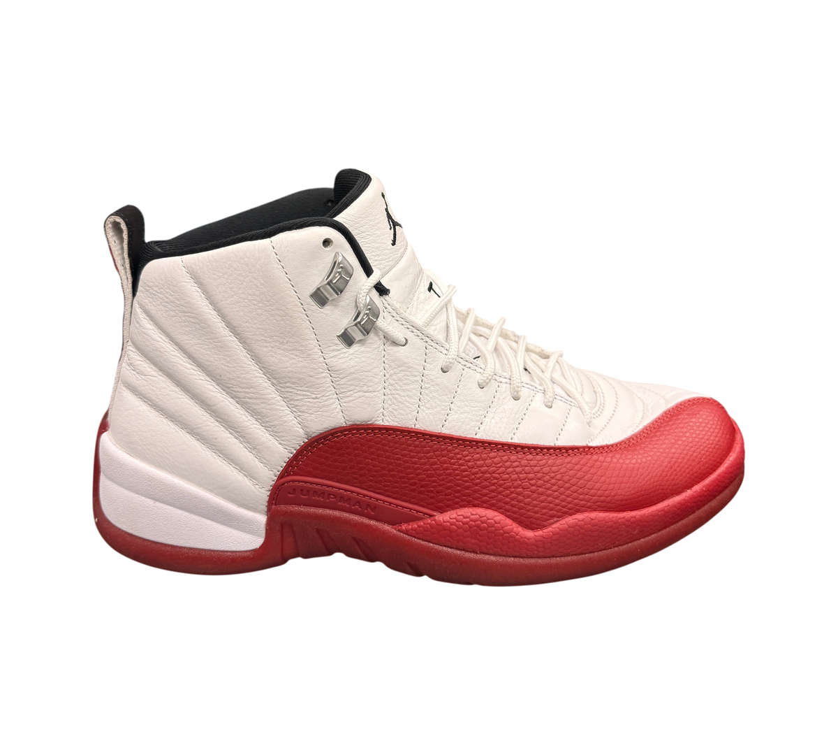 Genesis Boutique Jordan 12 Cherry sneakers in white and red leather with metallic silver eyelets.