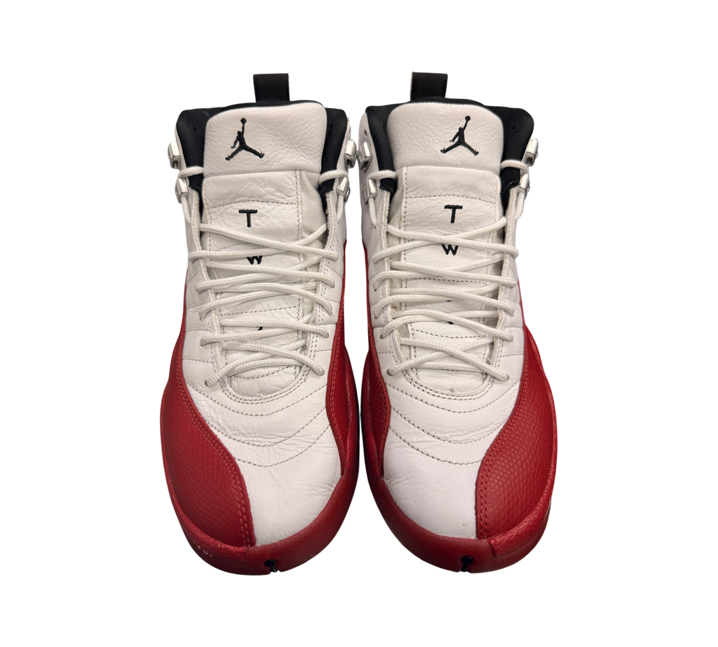 Genesis Boutique pre-owned Jordan 12 Cherry sneakers in white and red leather with black Jumpman branding.