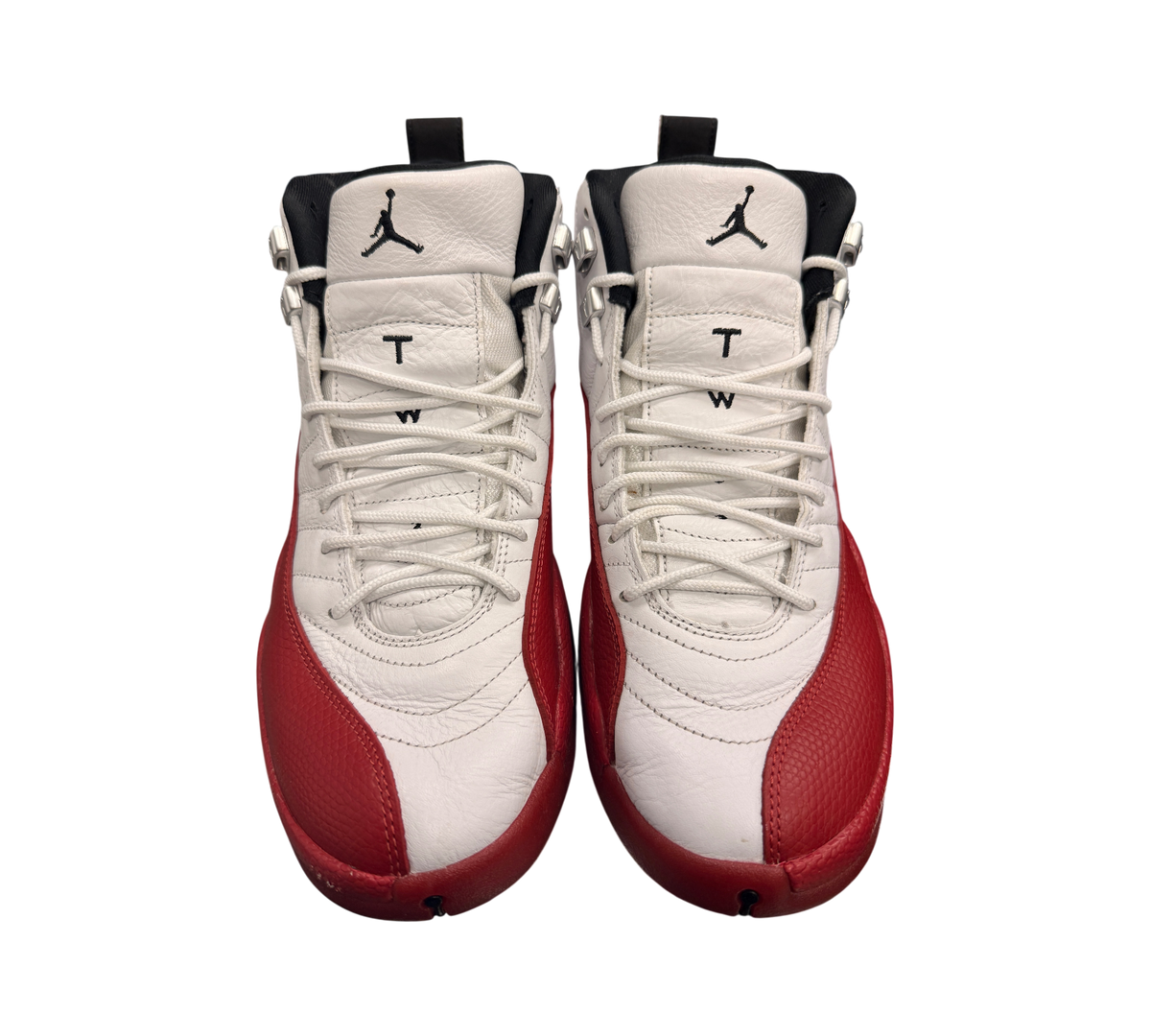 Genesis Boutique pre-owned Jordan 12 Cherry sneakers in white and red leather with black Jumpman branding.