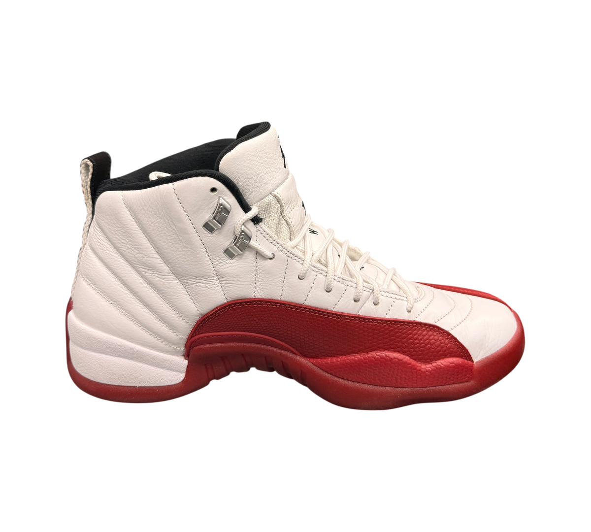 Genesis Boutique used Jordan 12 Cherry sneakers in white and red leather with metallic silver eyelets.