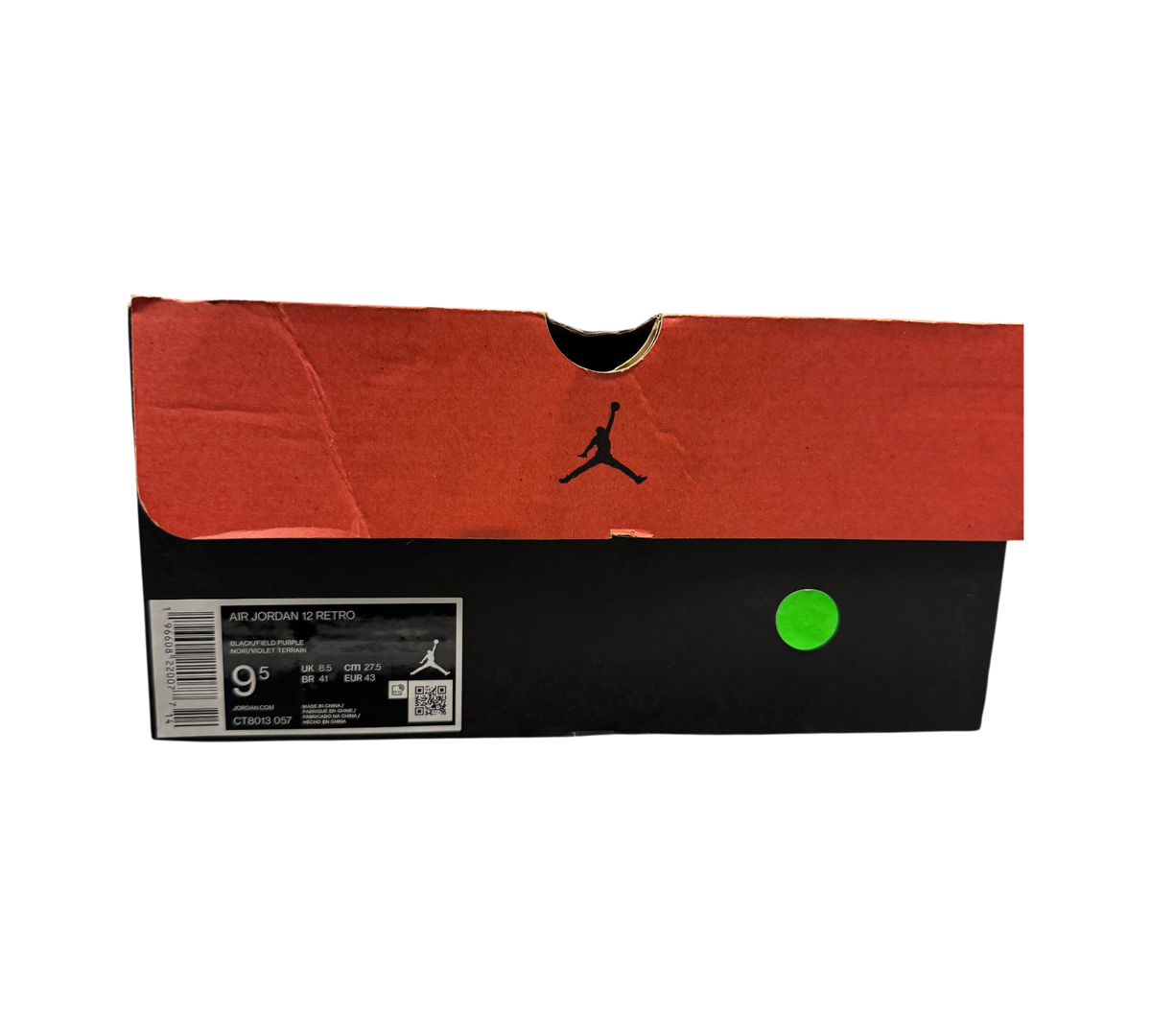 Genesis Boutique Jordan 12 Field Purple shoebox with size 9.5 label and Jumpman logo in a retail store setting