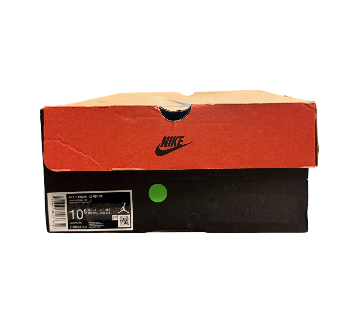 Genesis Boutique Jordan 12 Flu Game sneaker box with Nike branding and size label in a retail store setting
