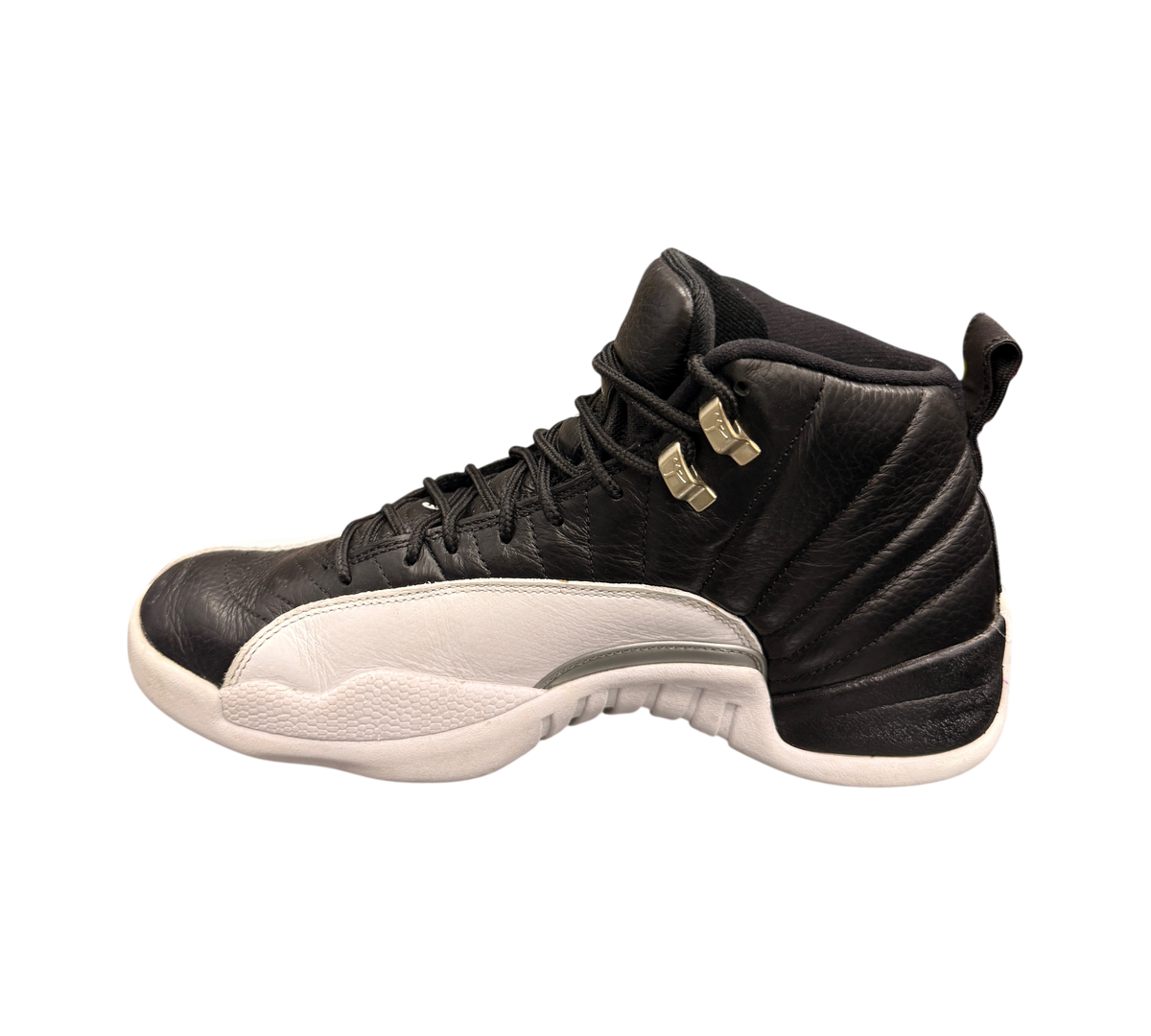 Genesis Boutique pre-owned Jordan 12 Playoff sneakers in black and white leather with silver eyelets.