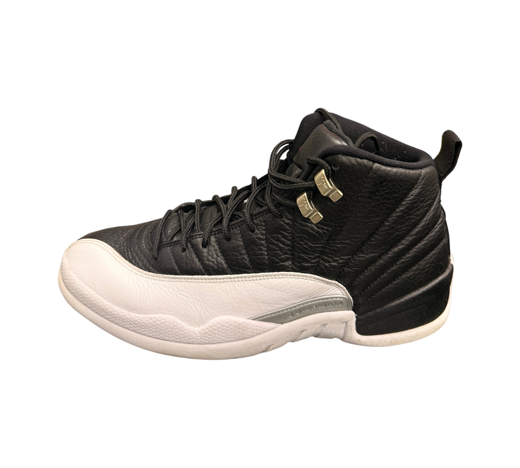 Genesis Boutique pre-owned Jordan 12 Playoff sneakers in black and white leather with silver eyelets.