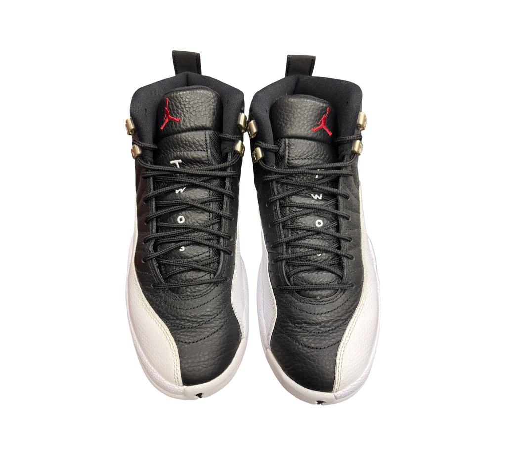 Genesis Boutique Jordan 12 Playoff sneakers in black and white leather with red Jumpman logo on the tongue