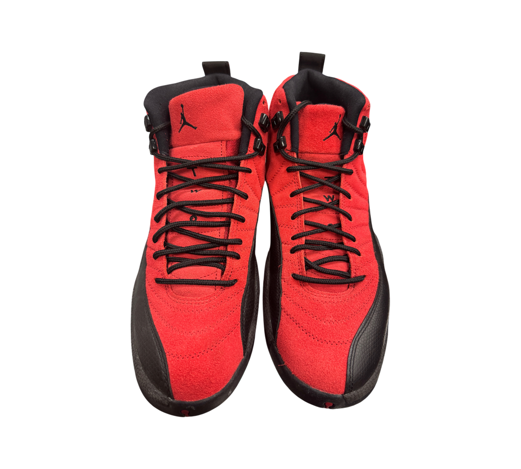Genesis Boutique used Jordan 12 Reverse Flu Game sneakers in red suede and black leather with black laces.