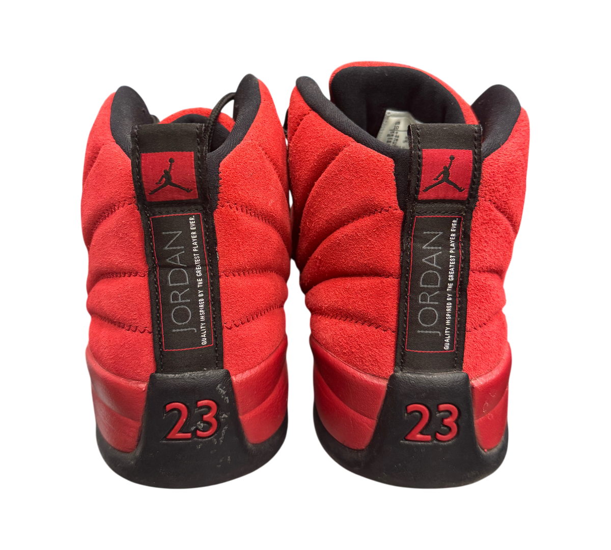 Genesis Boutique used Jordan 12 Reverse Flu Game sneakers in red suede with black accents and 23 heel branding.