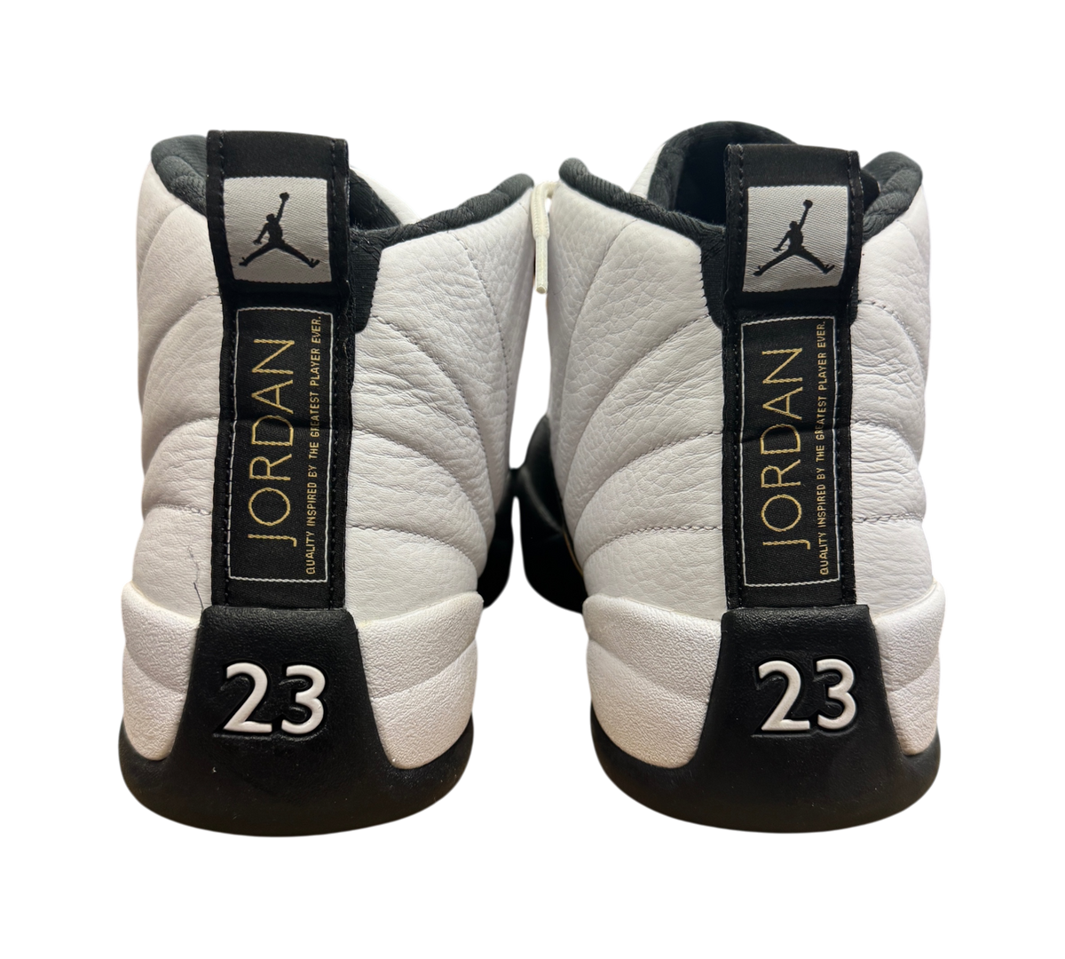 Genesis Boutique used Jordan 12 Royalty Taxi sneakers showing white leather heels with black 23 and Jumpman branding