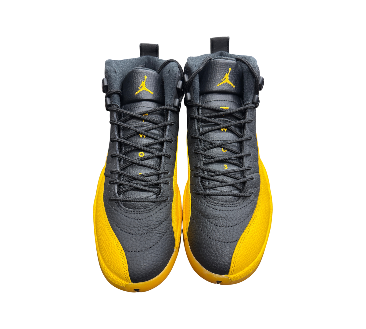 Genesis Boutique Jordan 12 University Gold sneakers in black and yellow leather with lace-up closure