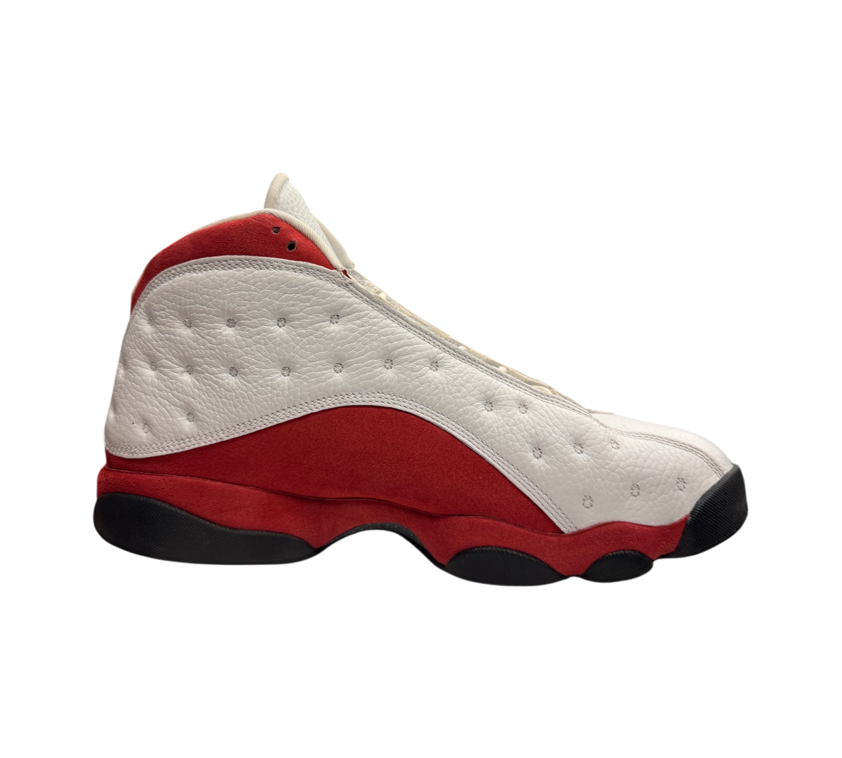 Genesis Boutique Jordan 13 Chicago sneakers in white and red leather with a side profile view