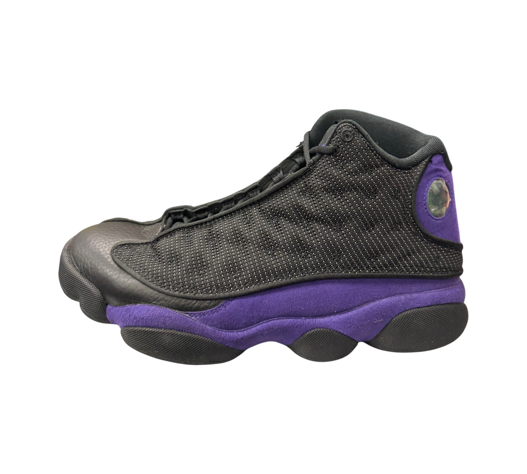 Genesis Boutique Jordan 13 Court Purple sneakers featuring black leather and mesh upper with vibrant purple suede accents.